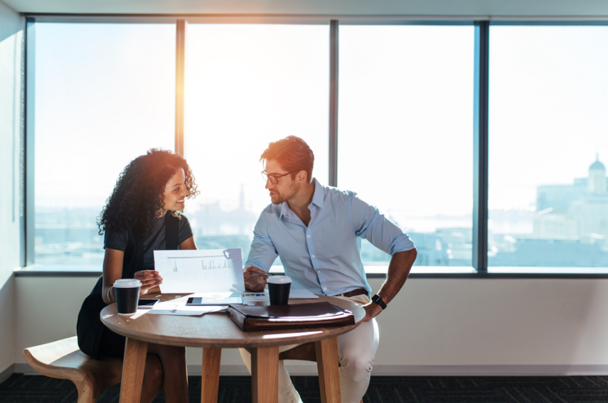 people looking at paperwork